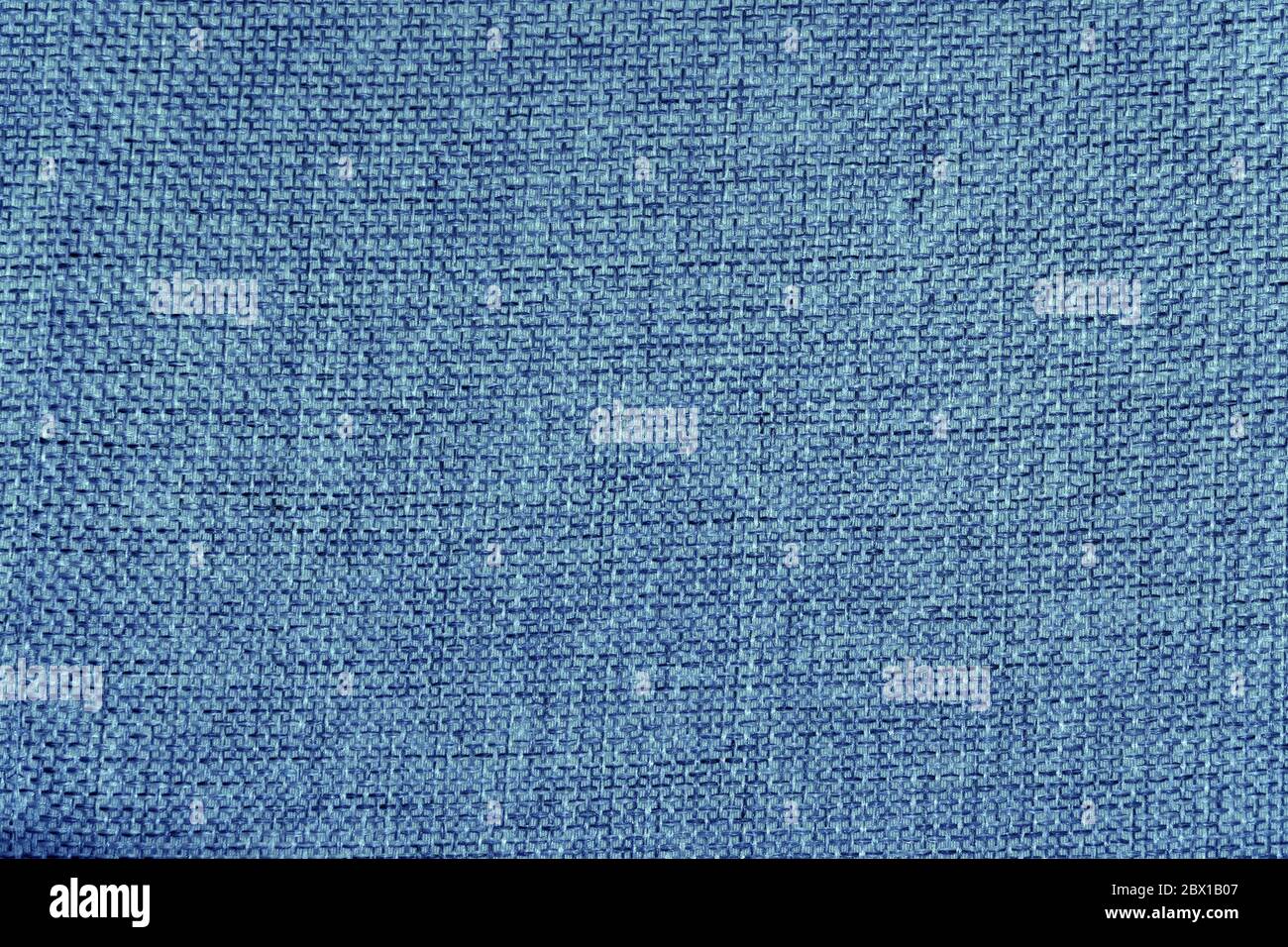 Abstrakter Hintergrund aus grob gewebtem Stoff in blauer Farbe für Design Stockfoto