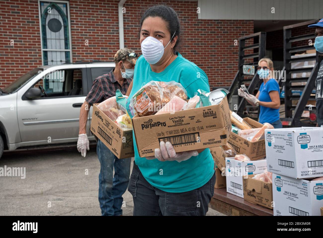 High Springs Mobile Pantry ist eine Lebensmittelbank, die mit "Brot der Mächtigen" arbeitet, um Nahrung an Bedürftige in High Springs, Florida, zu verteilen. Stockfoto