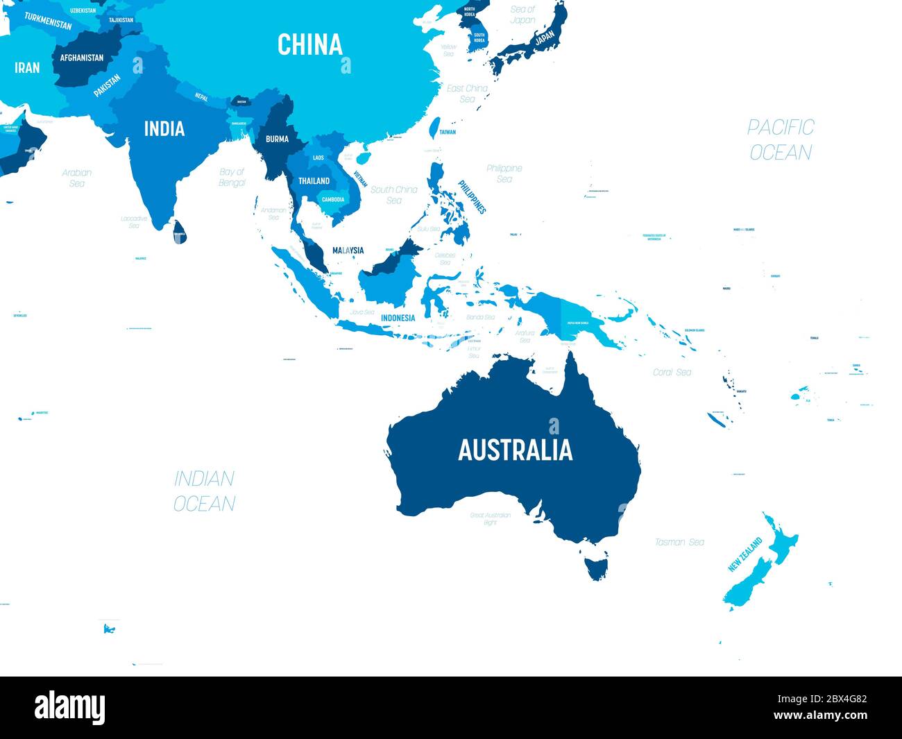 Australien und Südostasien Karte - grüner Farbton auf dunklem Hintergrund. Detaillierte politische Karte der australischen und südöstlichen Asien-Region mit Land-, Kapital-, Meer- und Meeresnamen. Stock Vektor