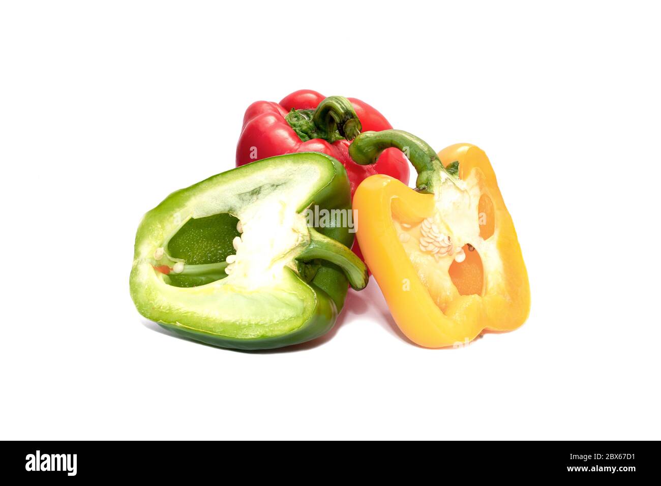 Drei Paprika isoliert auf weißem Hintergrund. Diät-Essen und veganes Konzept Stockfoto