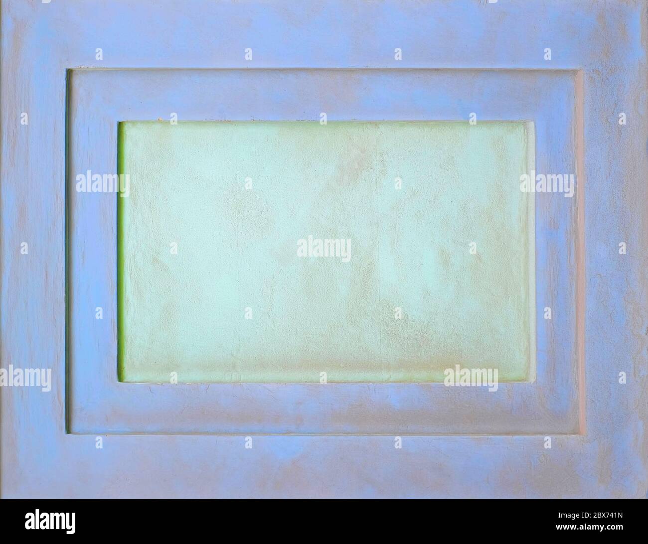 Leere eleganten pastellgrünen Oberfläche mit hellblauen Framing, Hintergrund oder Kulisse für Text. Stockfoto