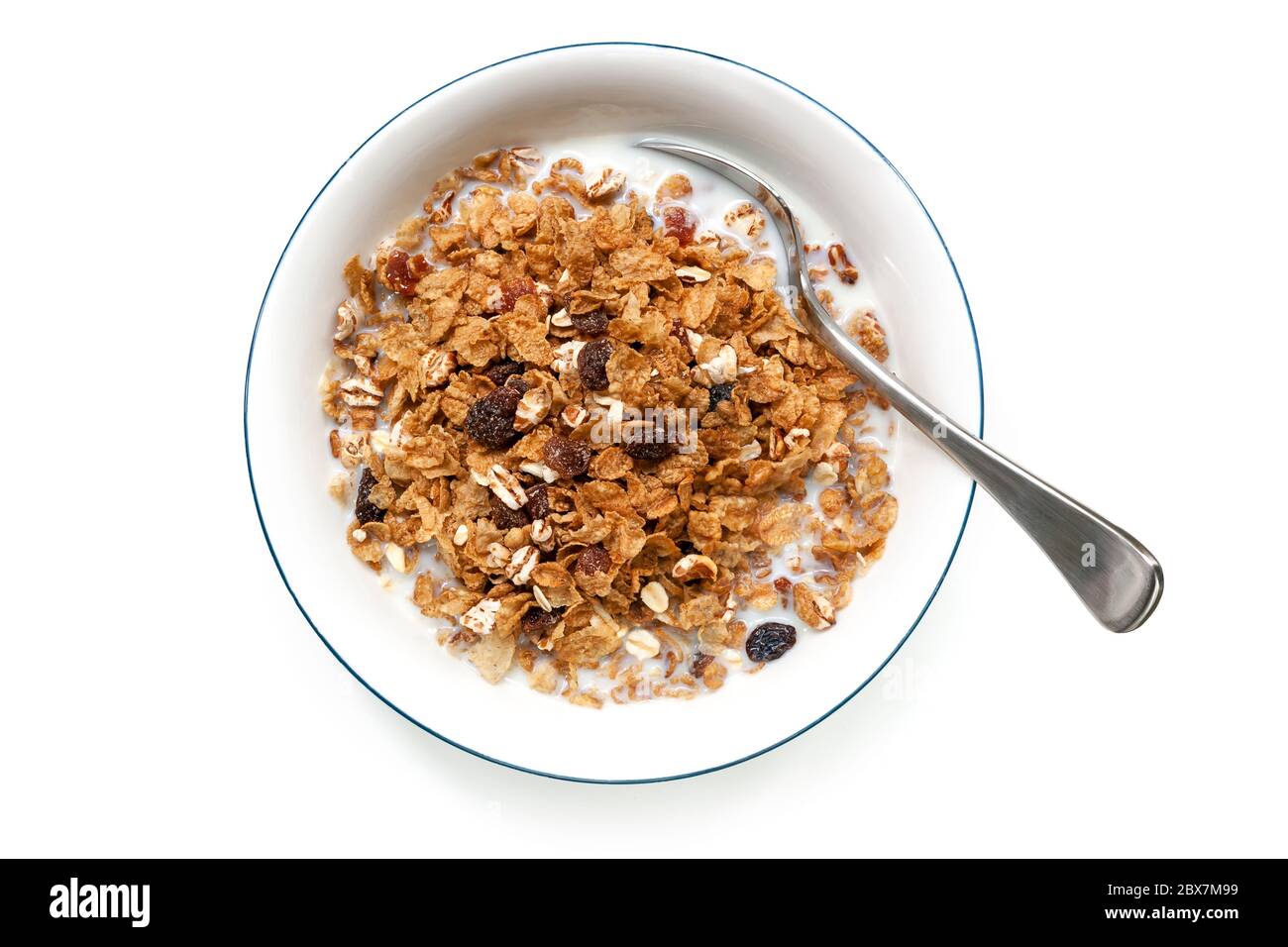 Schüssel Müsli mit Löffel, isoliert auf weiß. Ansicht von oben. Stockfoto