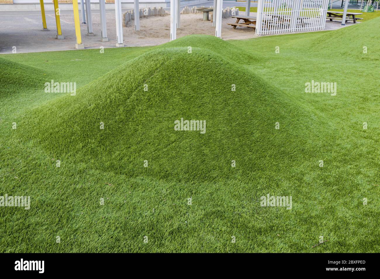 Nahaufnahme Ansicht des Spielplatzes von Kindergarten mit Kunstrasen bedeckt. Europa. Schweden. Stockfoto