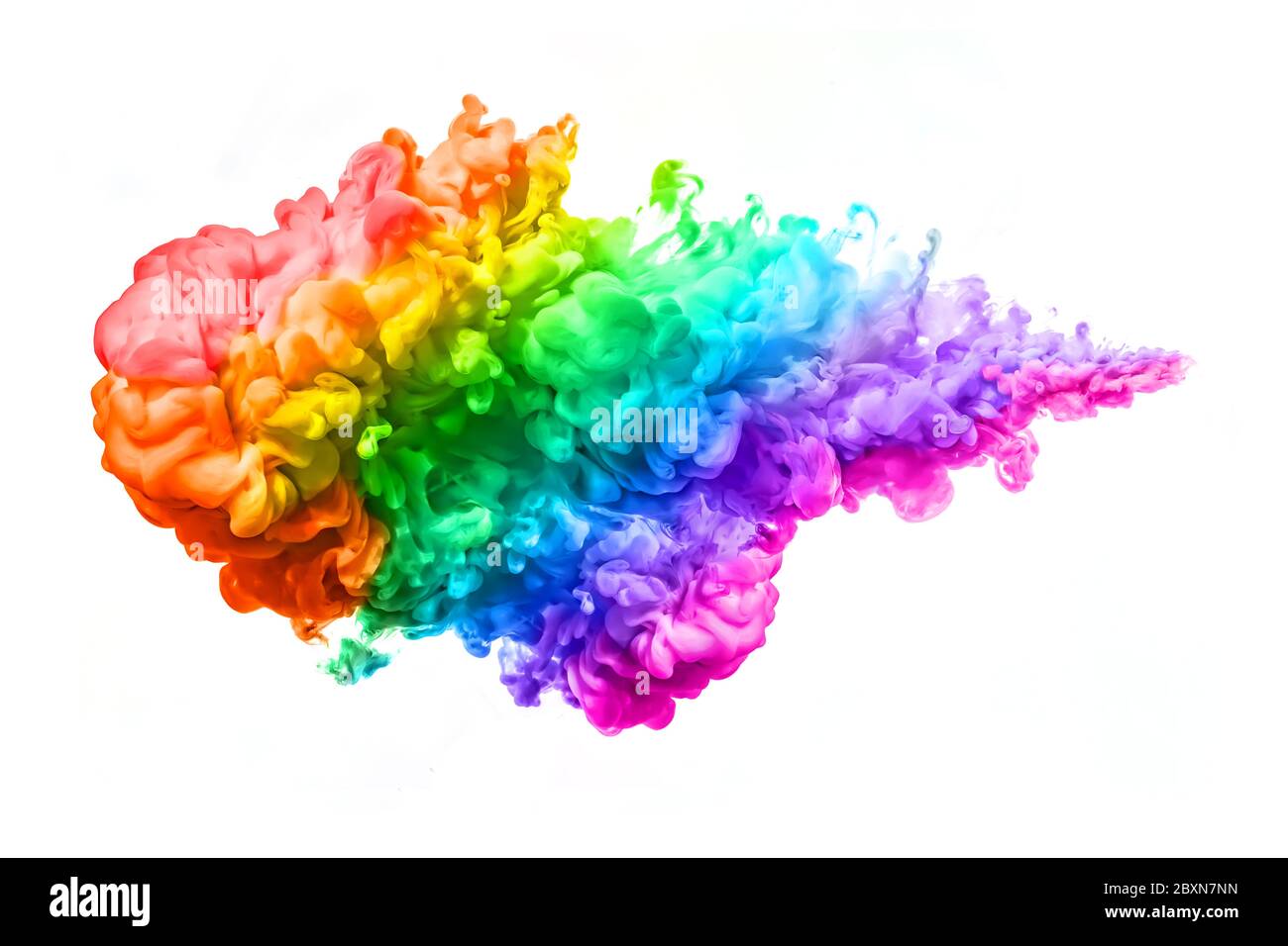 Tinte in Wasser isoliert auf weißem Hintergrund. Regenbogen der Farben. Farbexplosion Stockfoto