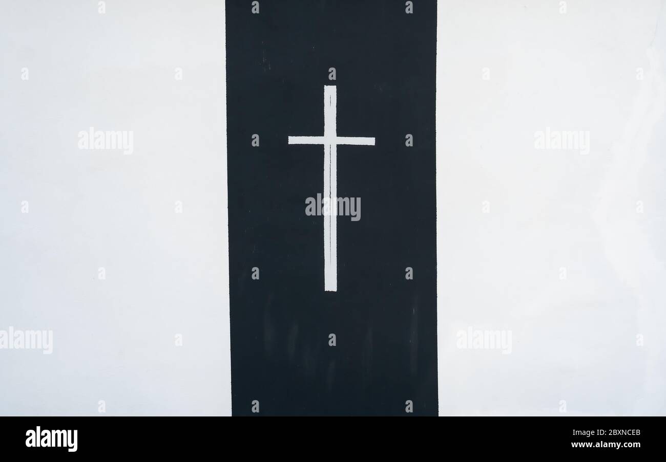 Fromiouse Kreuz Zeichen auf einer Wand eines christlichen Gebäudes Stockfoto