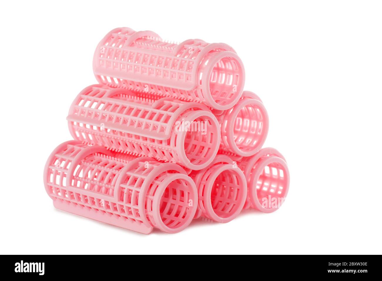 Rosafarbene Haarrollen Stockfoto