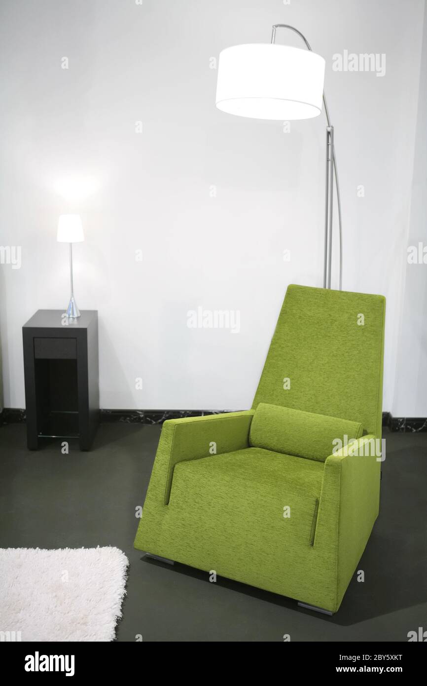 Interieur mit grünem Sessel Stockfoto