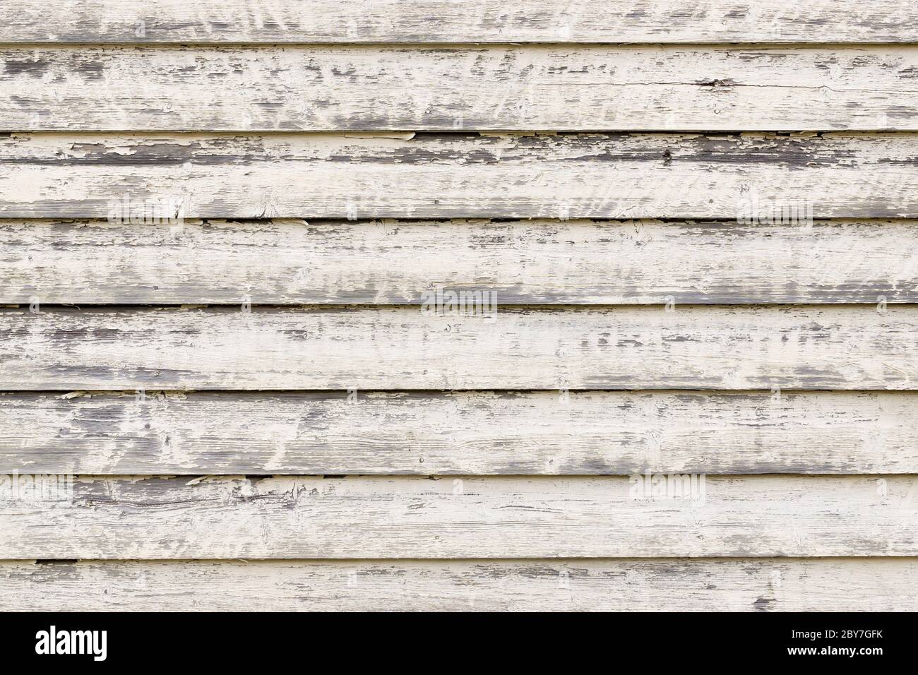 Weiß gemalte rustikale Holzplanken Hintergrund mit abblätternden Farbe. Stavanger, Norwegen. Stockfoto