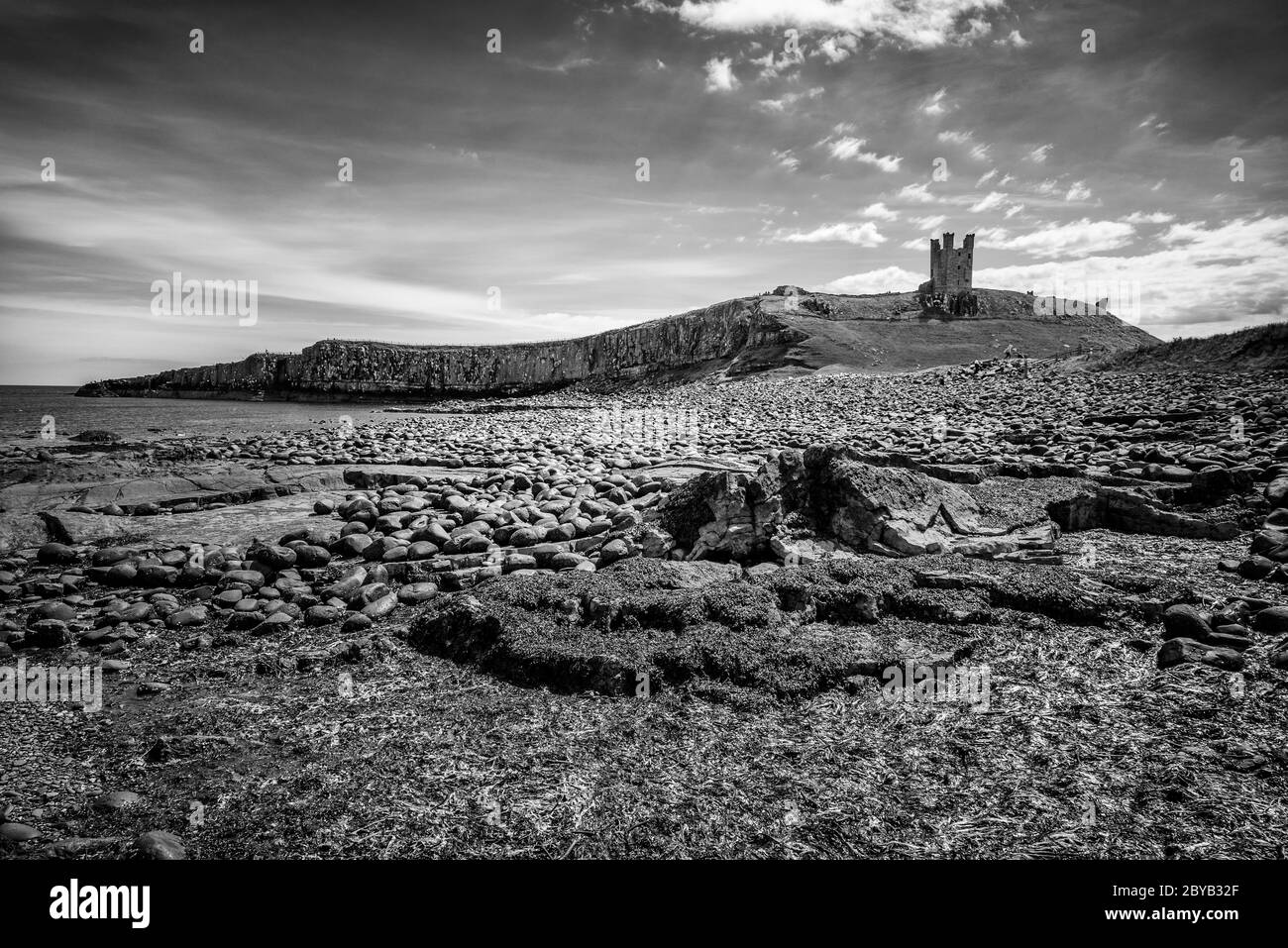 Ruinen von Lilburn Tower, Dunstanburgh Castle, Northumberland Stockfoto