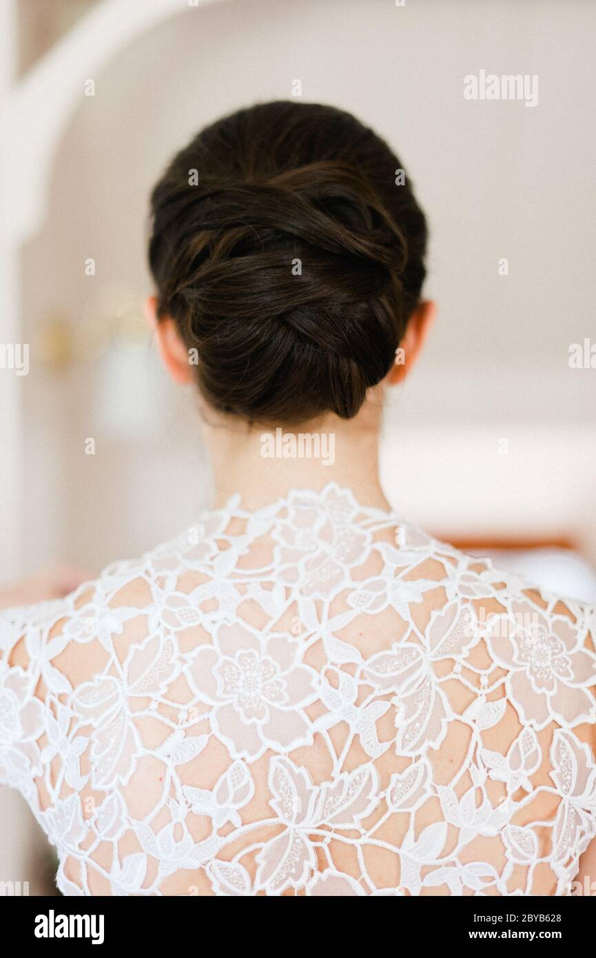 Komplizierte Spitze Detail Rückseite des Brautkleides Stockfoto