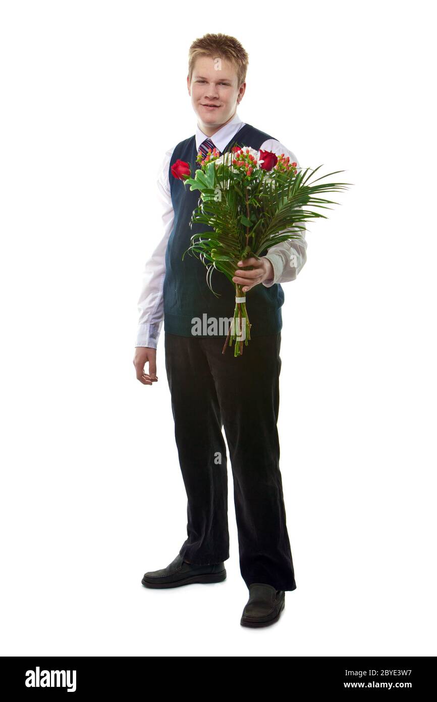 Schüler in Schuluniform mit einem Blumenstrauß Stockfoto