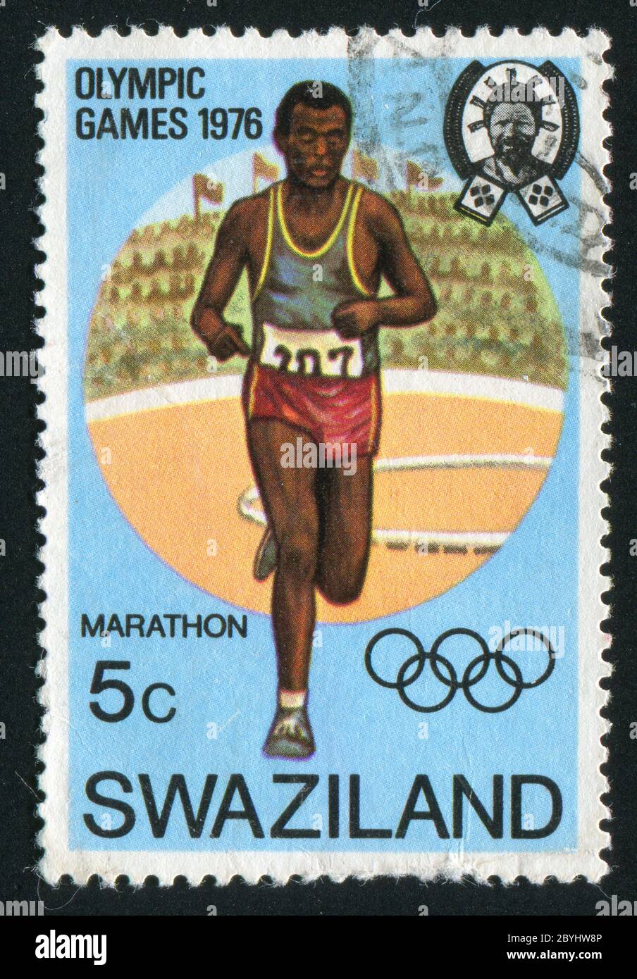 SWASILAND - UM 1976: Briefmarke gedruckt von Swasiland, zeigt 21. Olympische Spiele, Montreal, Kanada. Marathon Runner, um 1976. Stockfoto