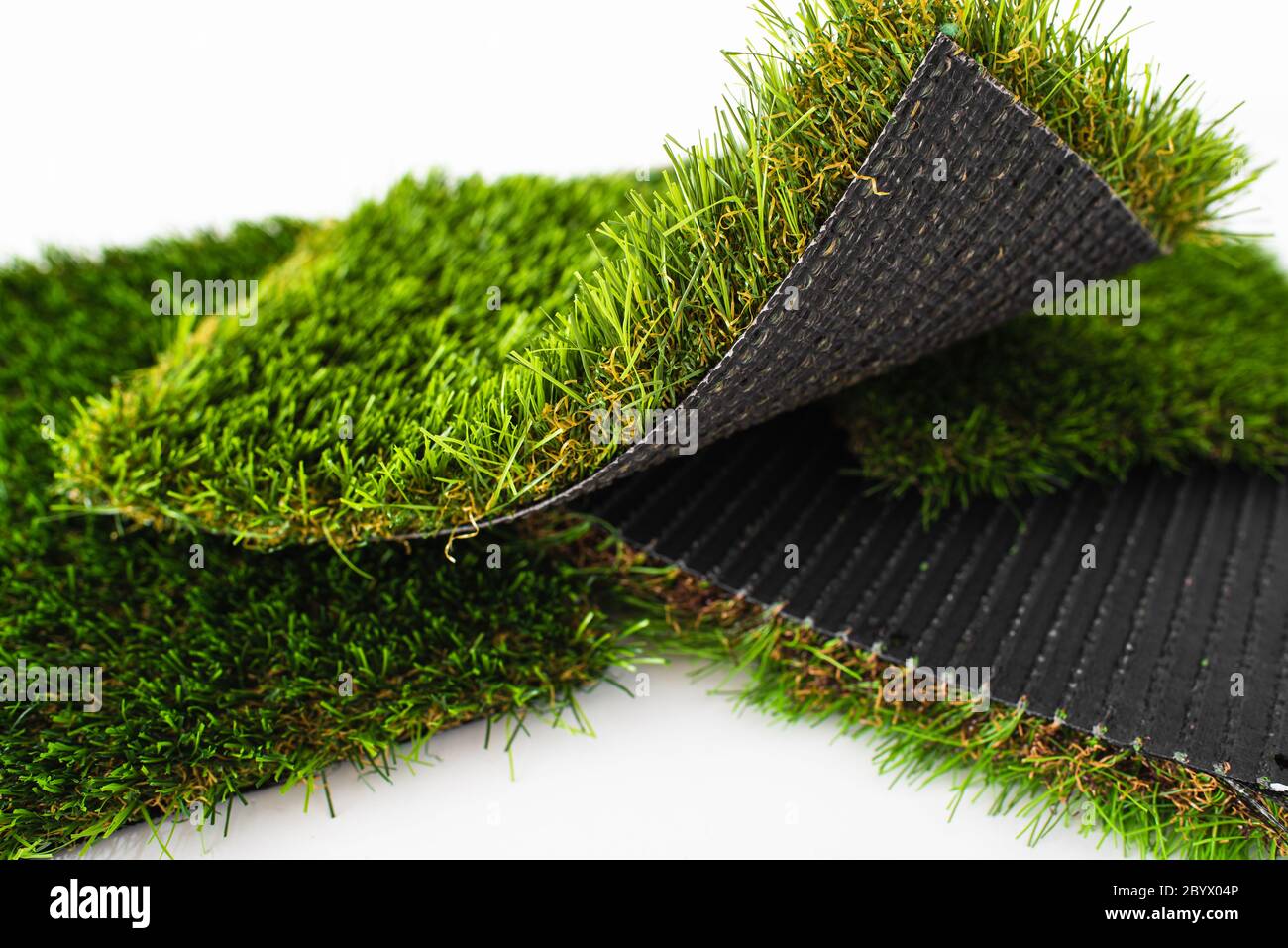 Probe Stücke von grünen Kunstrasen unterschiedlicher Dicke Stockfotografie  - Alamy