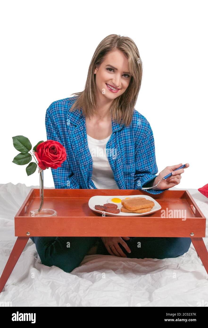 Frau-Frühstück im Bett Stockfoto