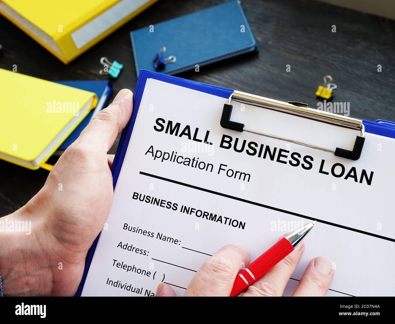 Leere Form für Kleinunternehmen Darlehen und Stift. Stockfoto