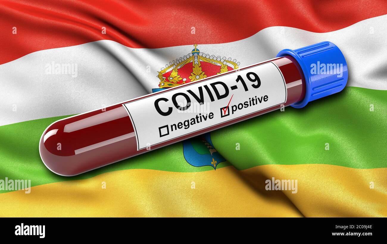 Flagge von La Rioja winkt im Wind mit einem positiven Covid-19 Blutteströhrchen. Stockfoto