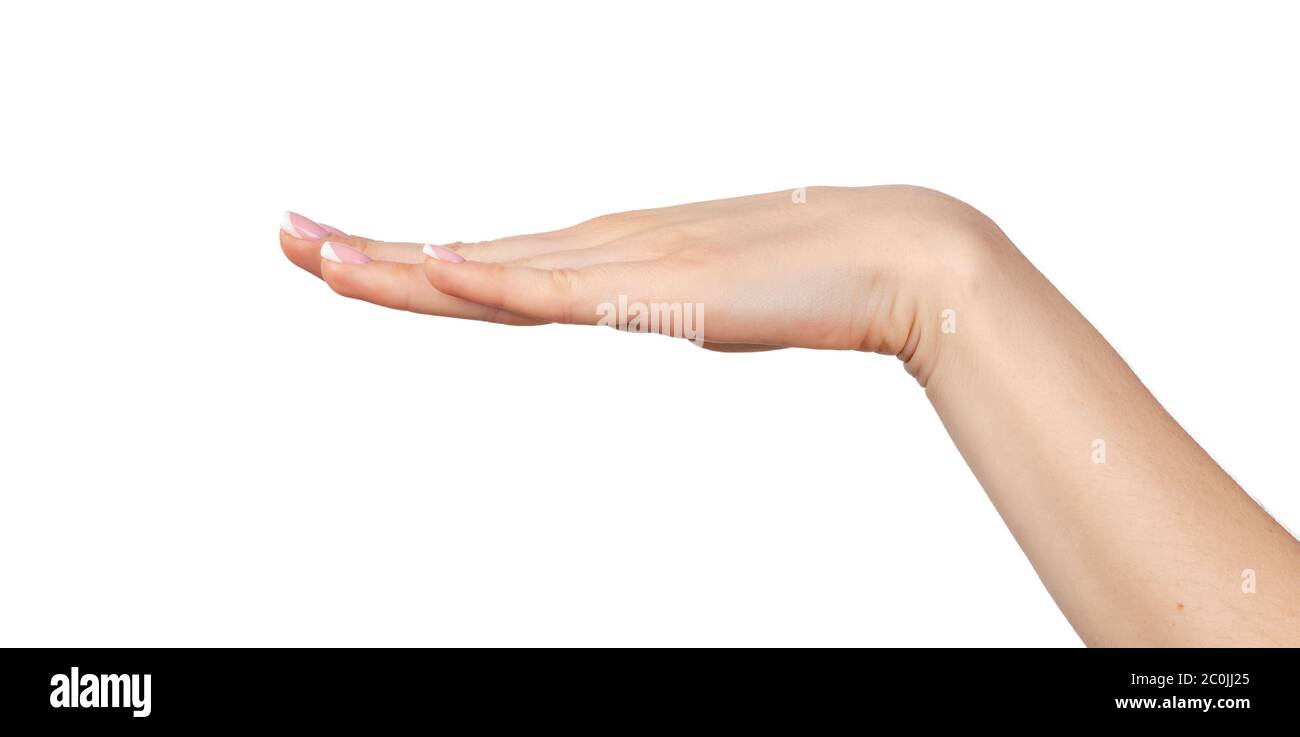 Weibliche Hand mit Handfläche unten isoliert auf weiß Stockfoto