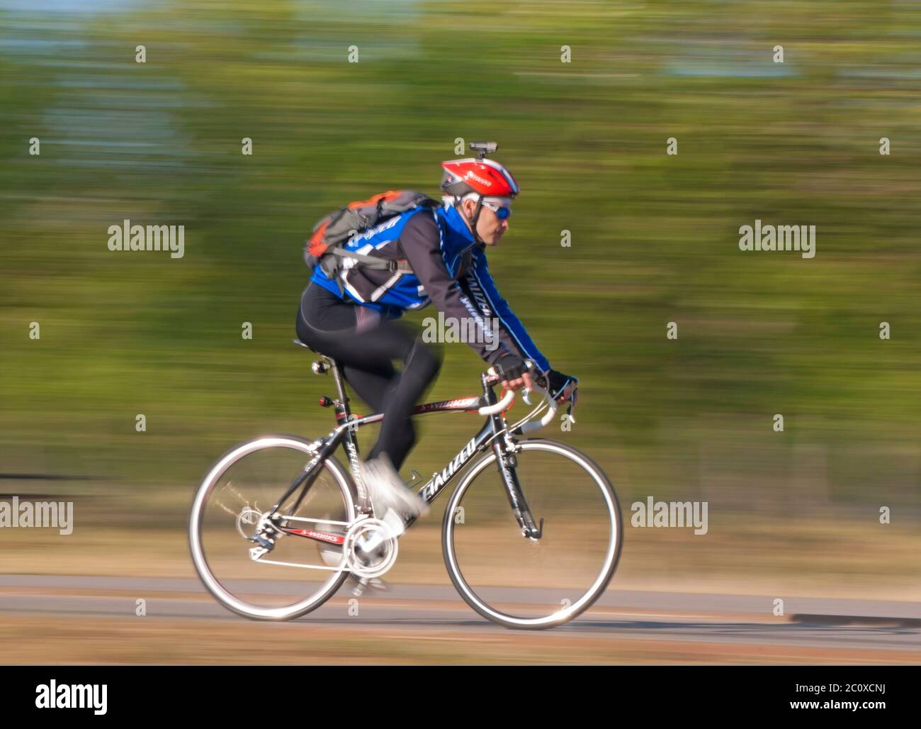 Rennrad, Fahrer Beschleunigung in unscharfen Bewegungen Stockfoto