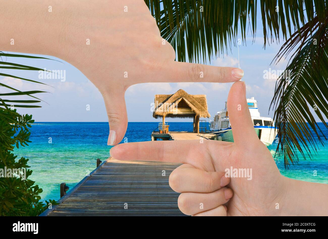 Gestell aus Händen und Strand Landschaft Stockfoto