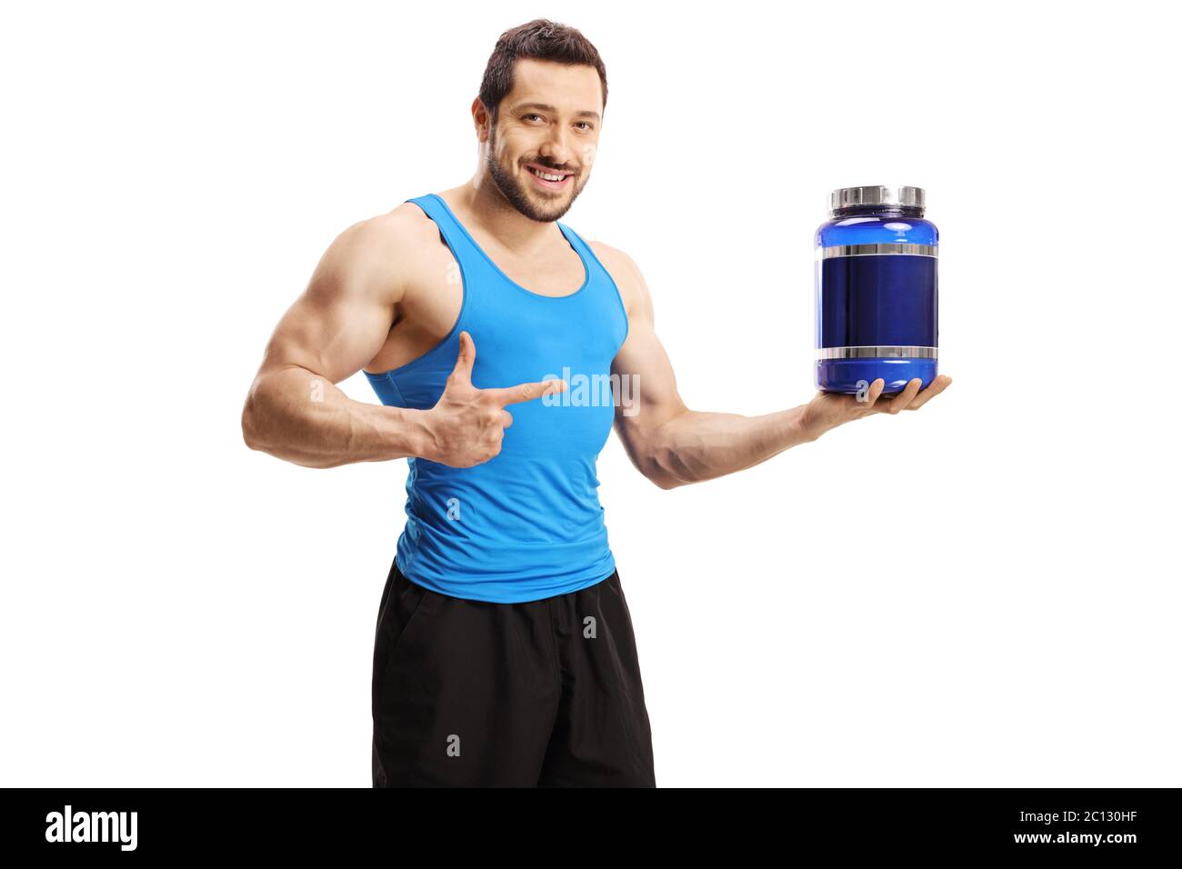 Muskulöser Bodybuilder hält eine Packung Protein-Pulver und zeigt isoliert auf weißem Hintergrund Stockfoto