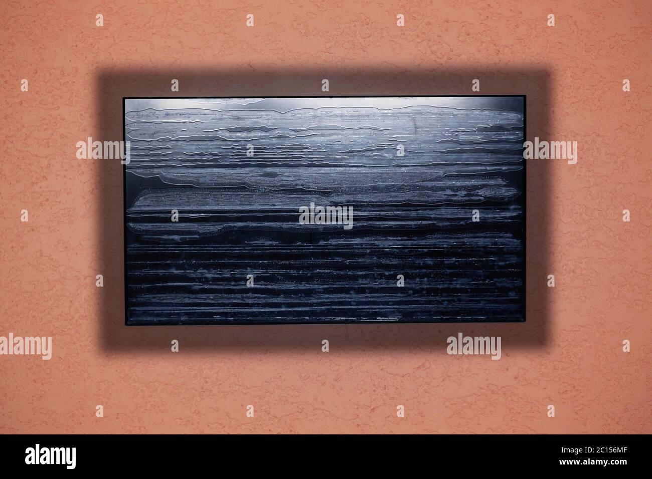 Computerbildschirm an der Wand. Stockfoto