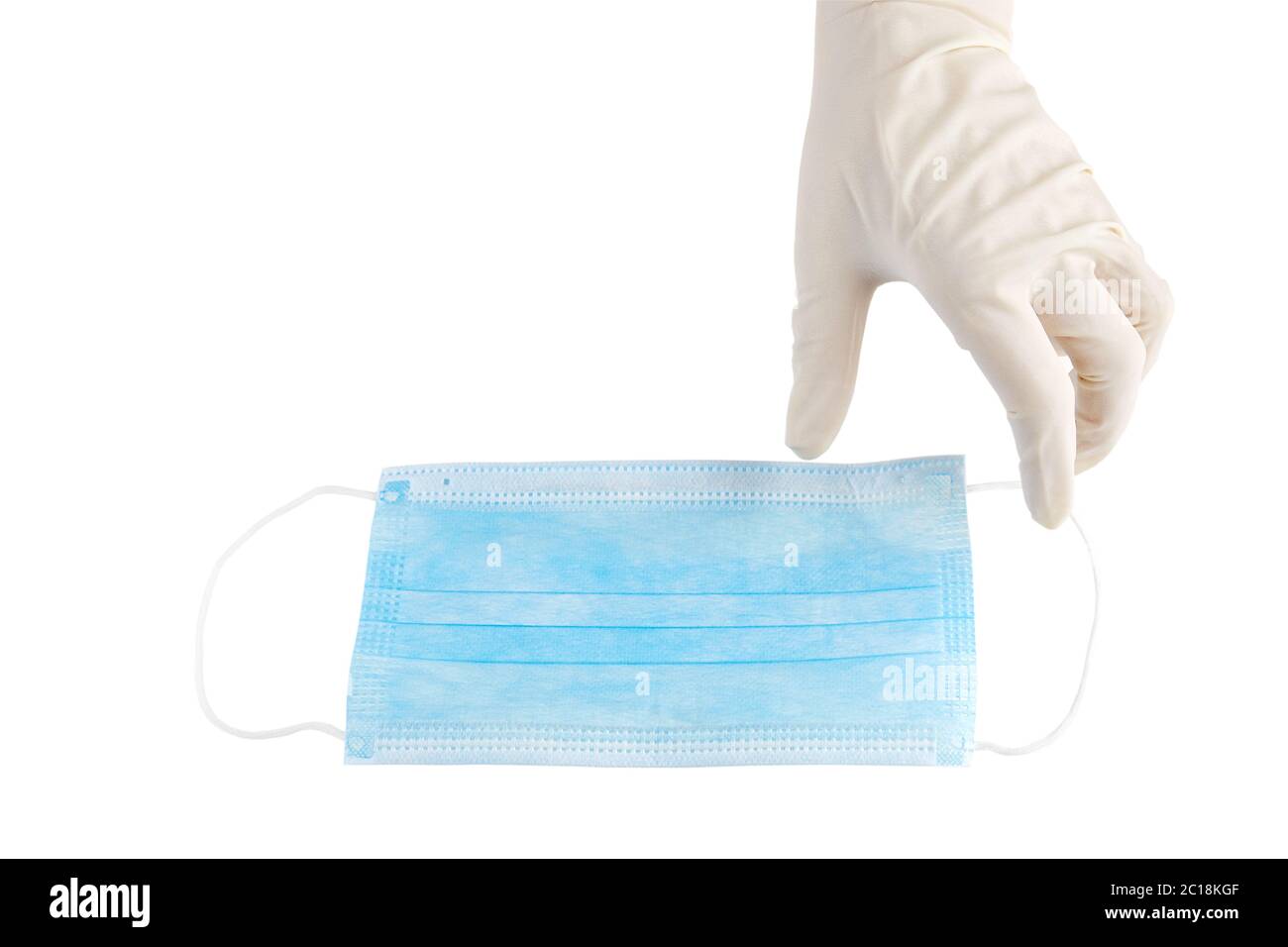 Hand in sterilen Gummihandschuh und blaue medizinische Gesichtsmaske isoliert auf weißem Hintergrund Stockfoto