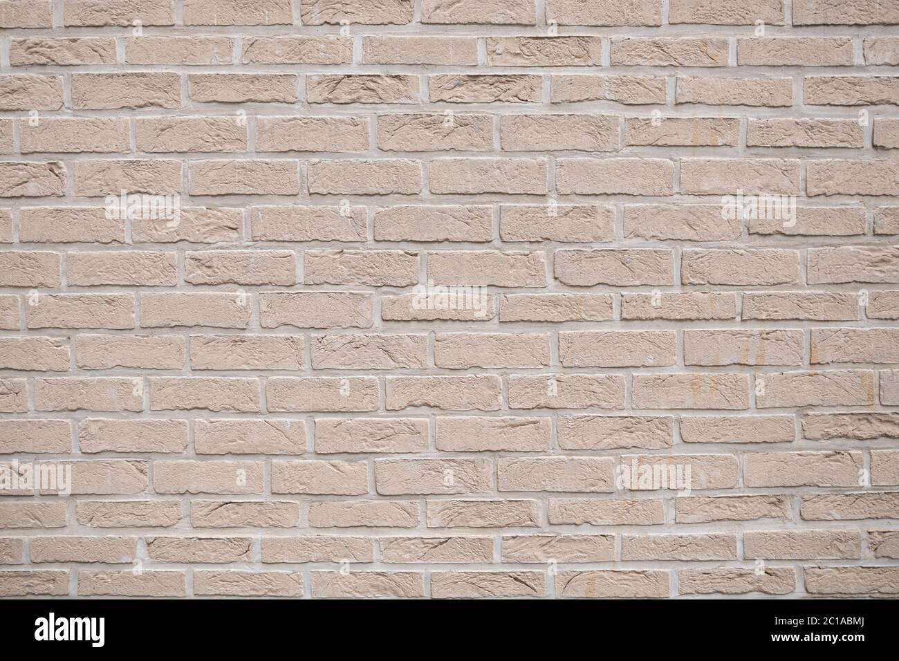 Beige alte Ziegelwand Hintergrund Grunge Textur Stockfoto