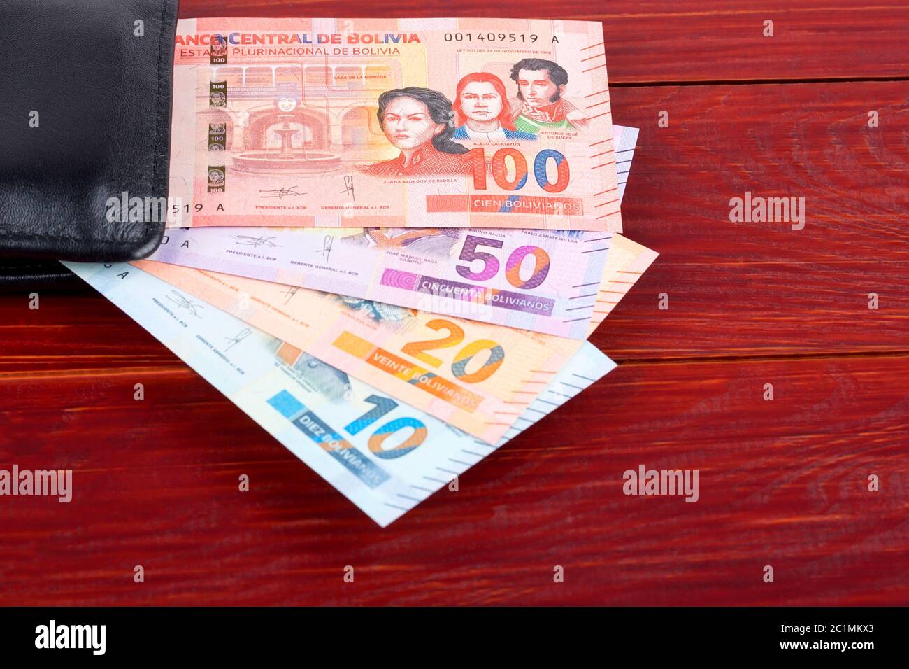 Bolivianischen Boliviano in der schwarzen Mappe Stockfoto