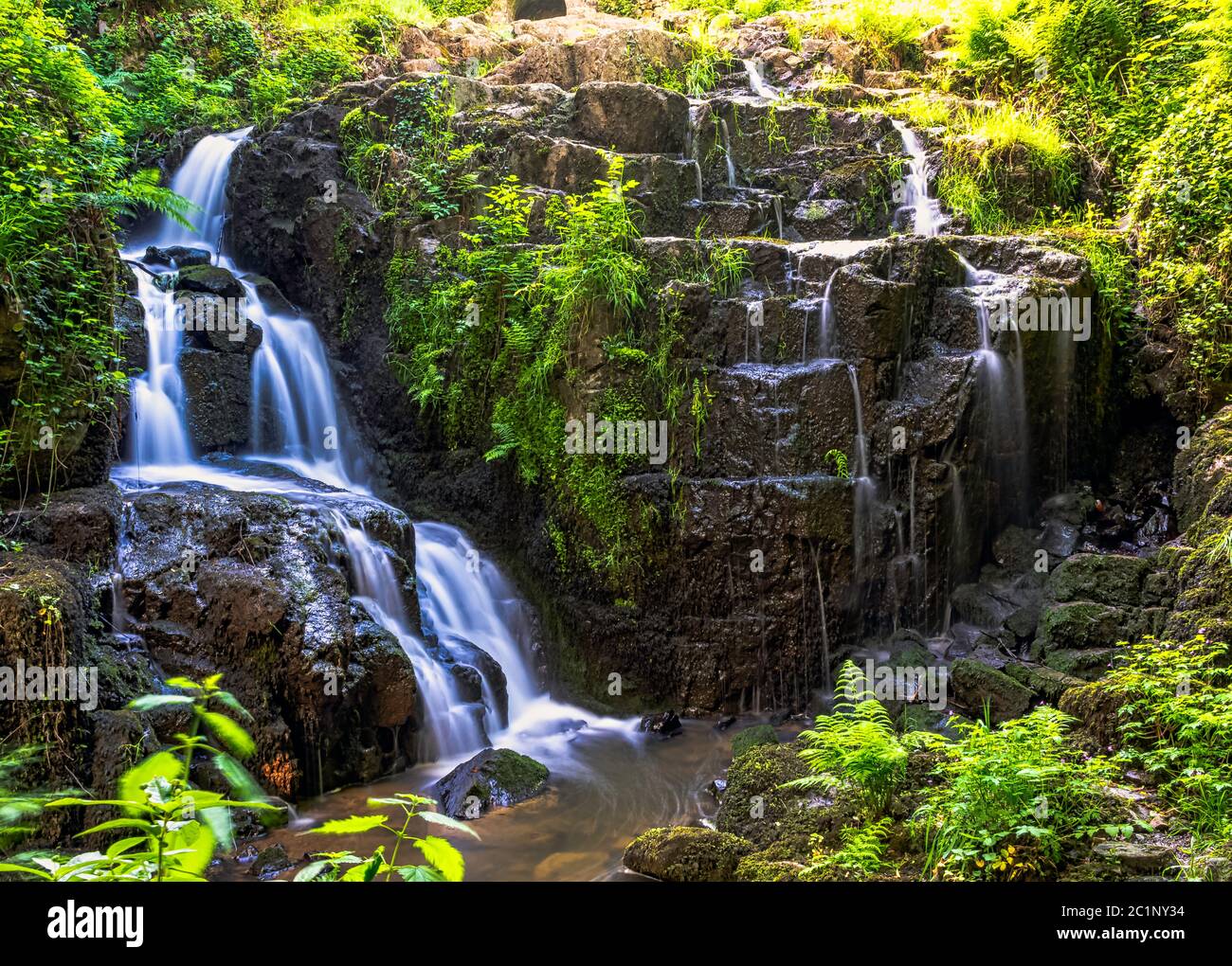 La Petite Cascade - der kleine Wasserfall von Cance und CanÃ§auf Flüssen - Le Neufbourg, Normandie, Frankreich Stockfoto