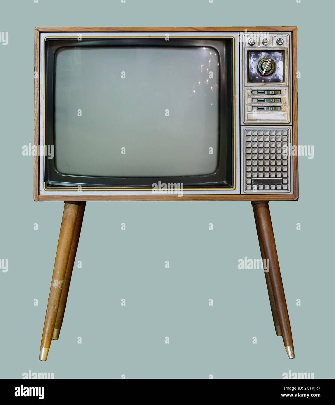 Vintage TV : alte Retro-Fernseher in Holzschrank auf isoliertem grünen Hintergrund mit Clipping-Pfad. Stockfoto