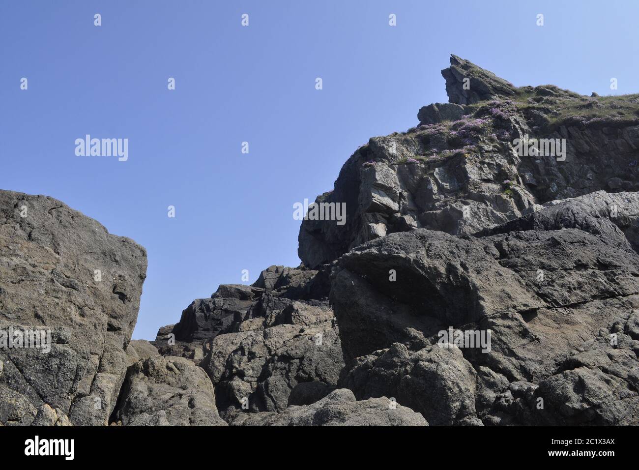 Steinstruktur vom Riff bei Pointe du Groin Stockfoto