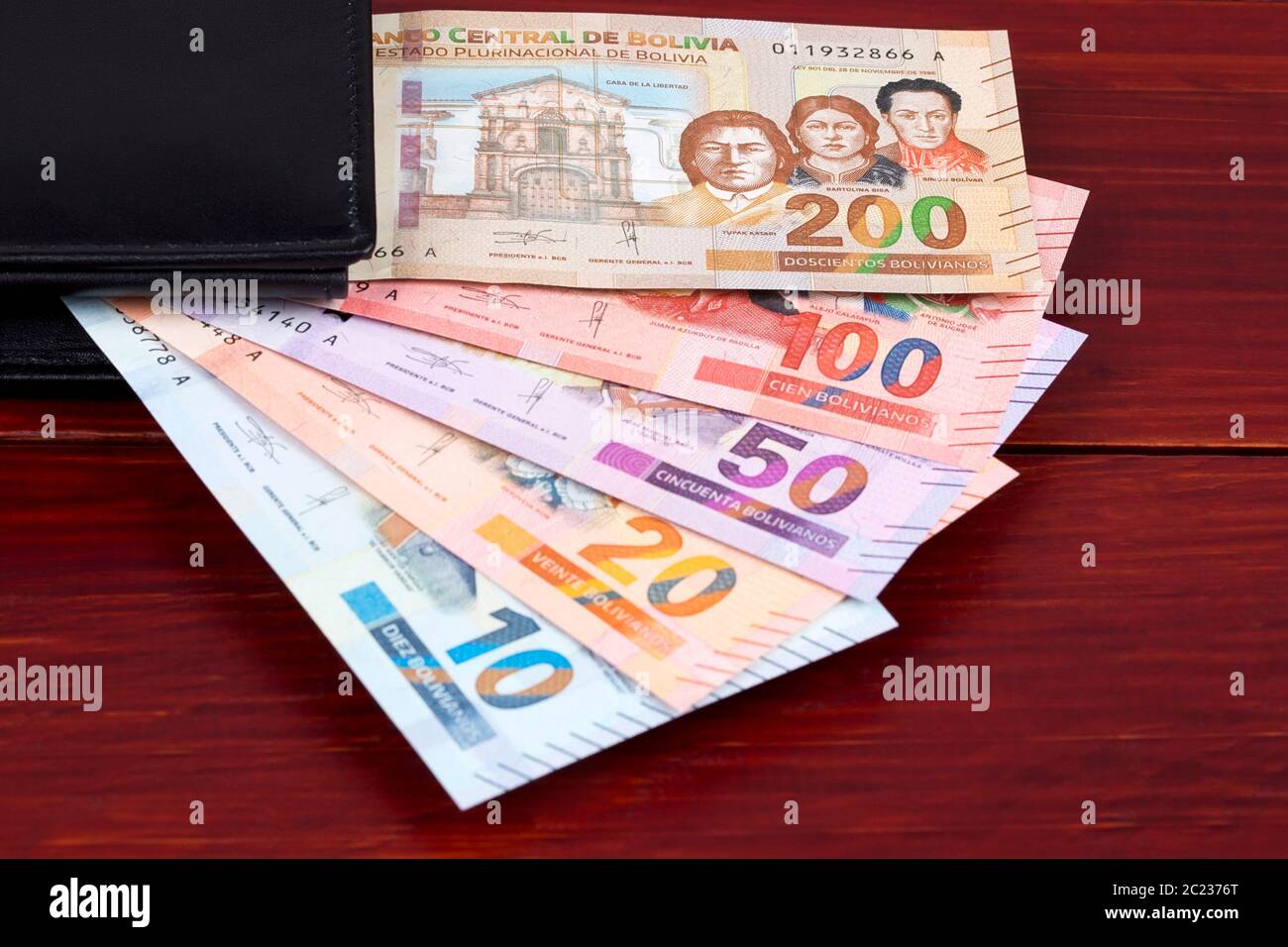 Bolivianischen Boliviano in der schwarzen Mappe Stockfoto