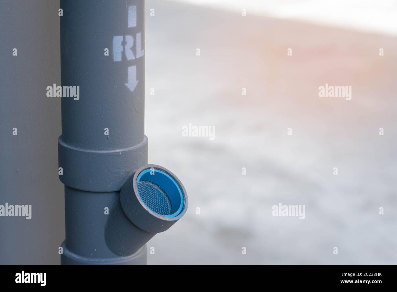 Dach ablassen vom Dach und Masse Stockfoto