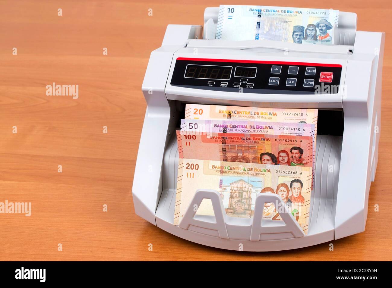Bolivianischen Boliviano in einer zählmaschine Stockfoto