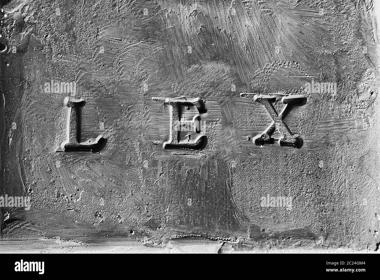 Das lateinische Wort "Lex auf einer rauhen Oberfläche eingraviert Stockfoto