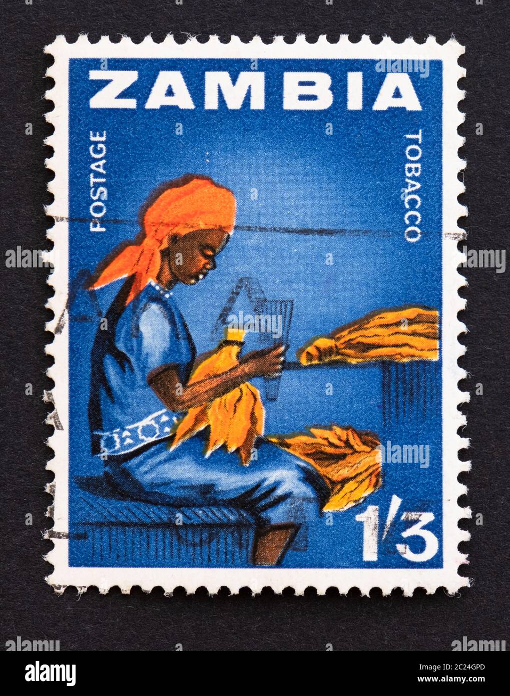 Sambia Briefmarke 1964 endgültig zeigt einen Tabakarbeiter Stockfoto