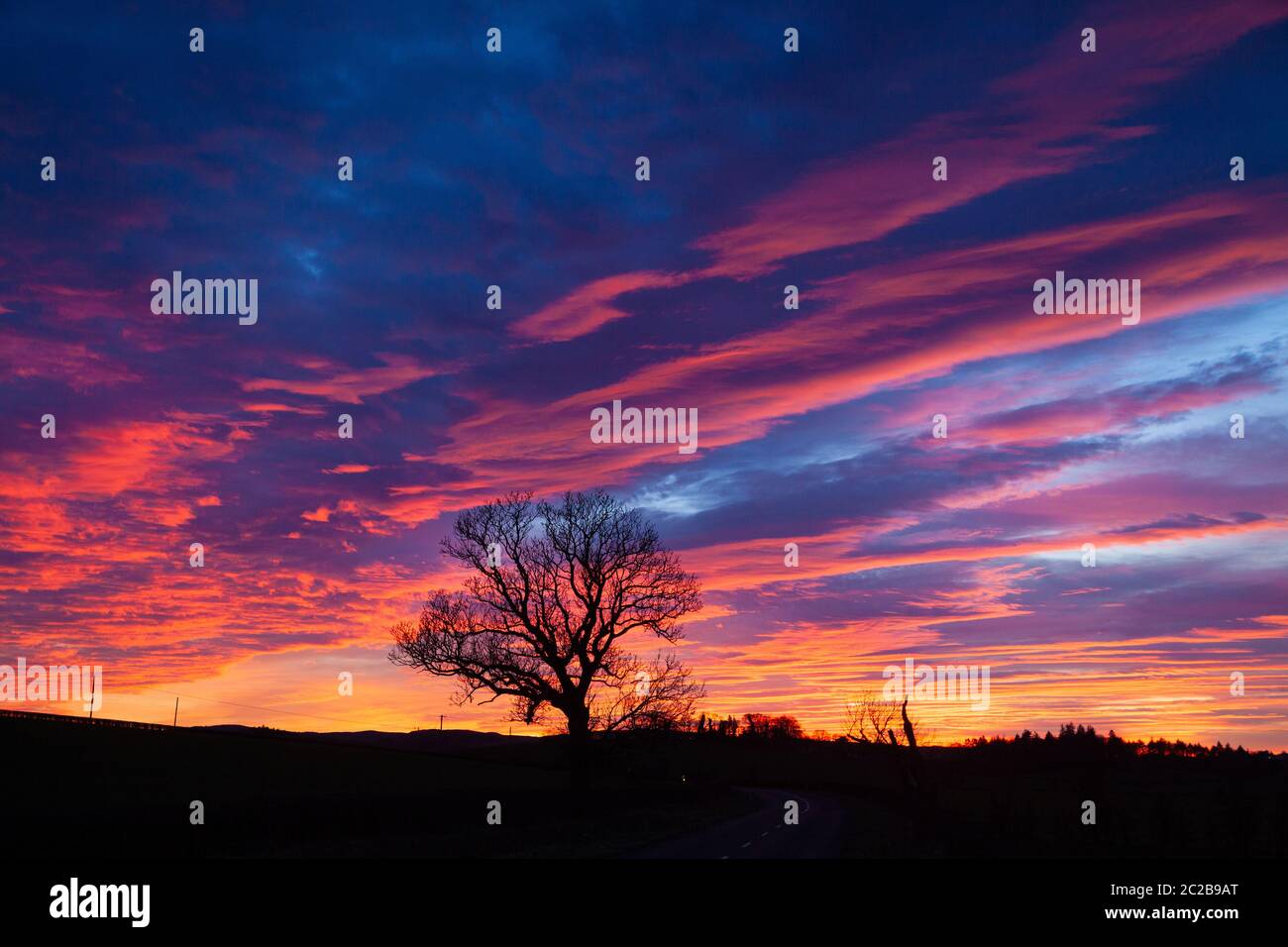 Ein dramatischer Sonnenuntergang in der Nähe von Ayr Schottland Stockfoto
