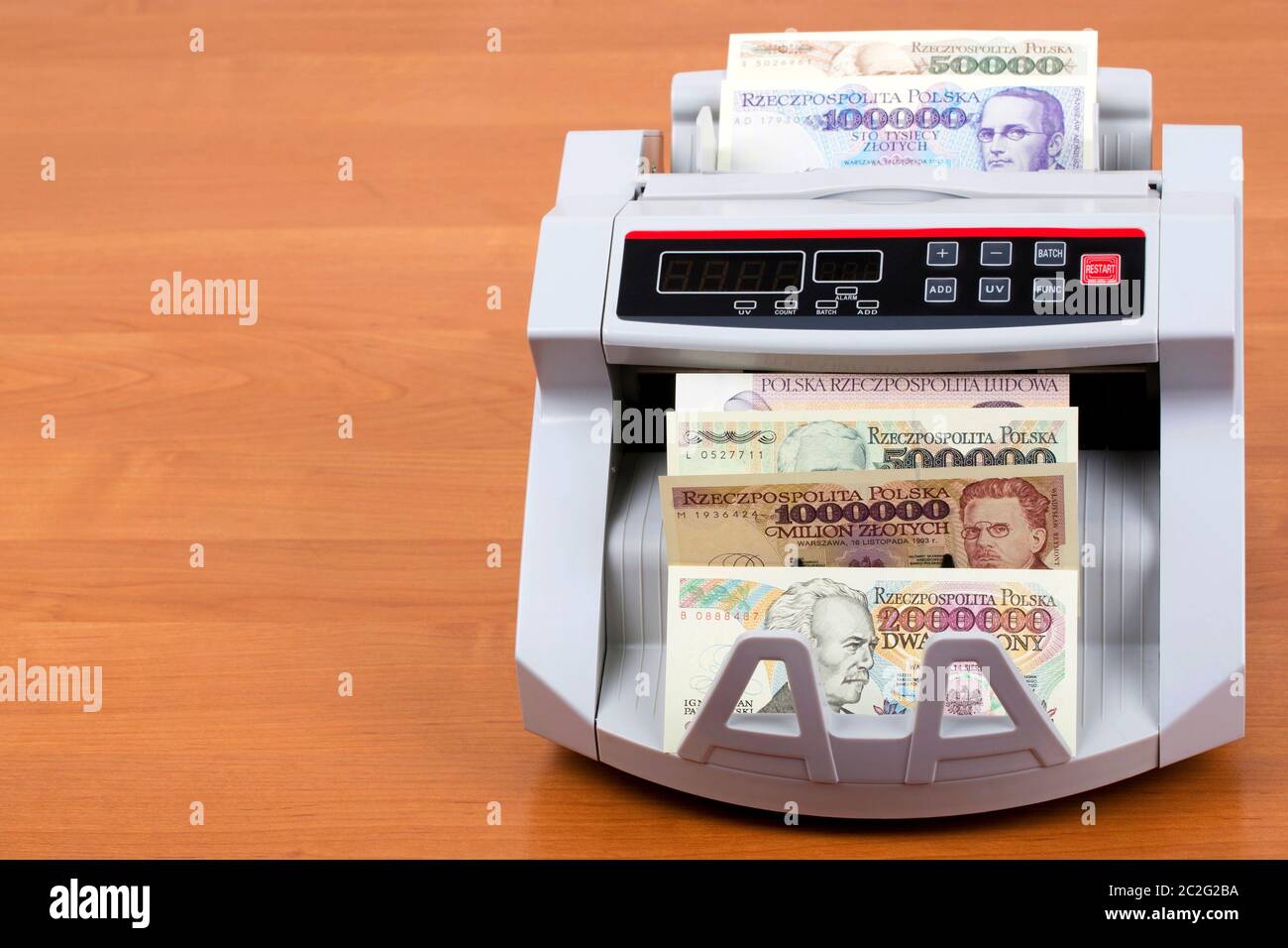 Alte Polnische Zloty in einer zählmaschine Stockfoto