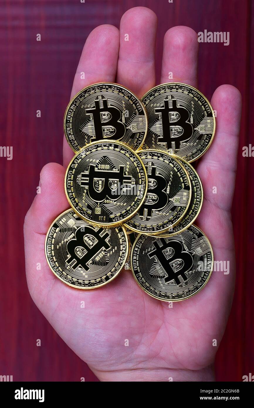 Bitcoins auf der Hand Stockfoto