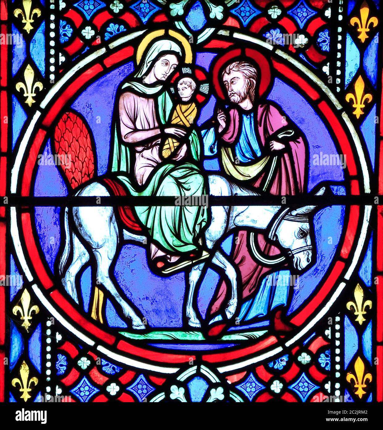 Krippenfenster, Glasmalerei von Oudinot von Paris, 1861, Feltwell Kirche, Norfolk. Maria, Josef und das Jesuskind fliehen nach Ägypten Stockfoto