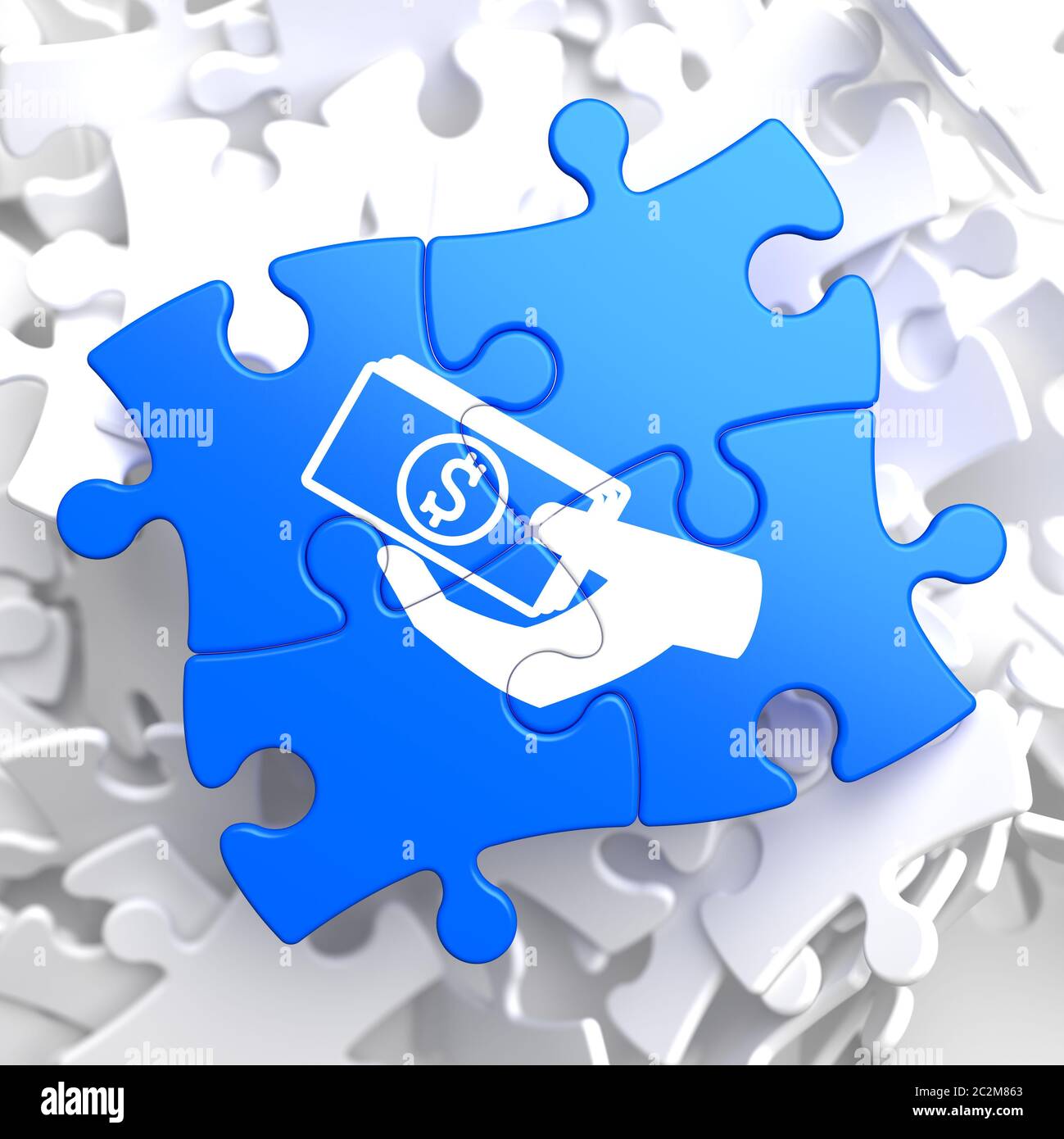 Spenden Konzept - Symbol des Geldes in der Hand - auf blauen Puzzle-Stücke. Sozialer Hintergrund. Stockfoto