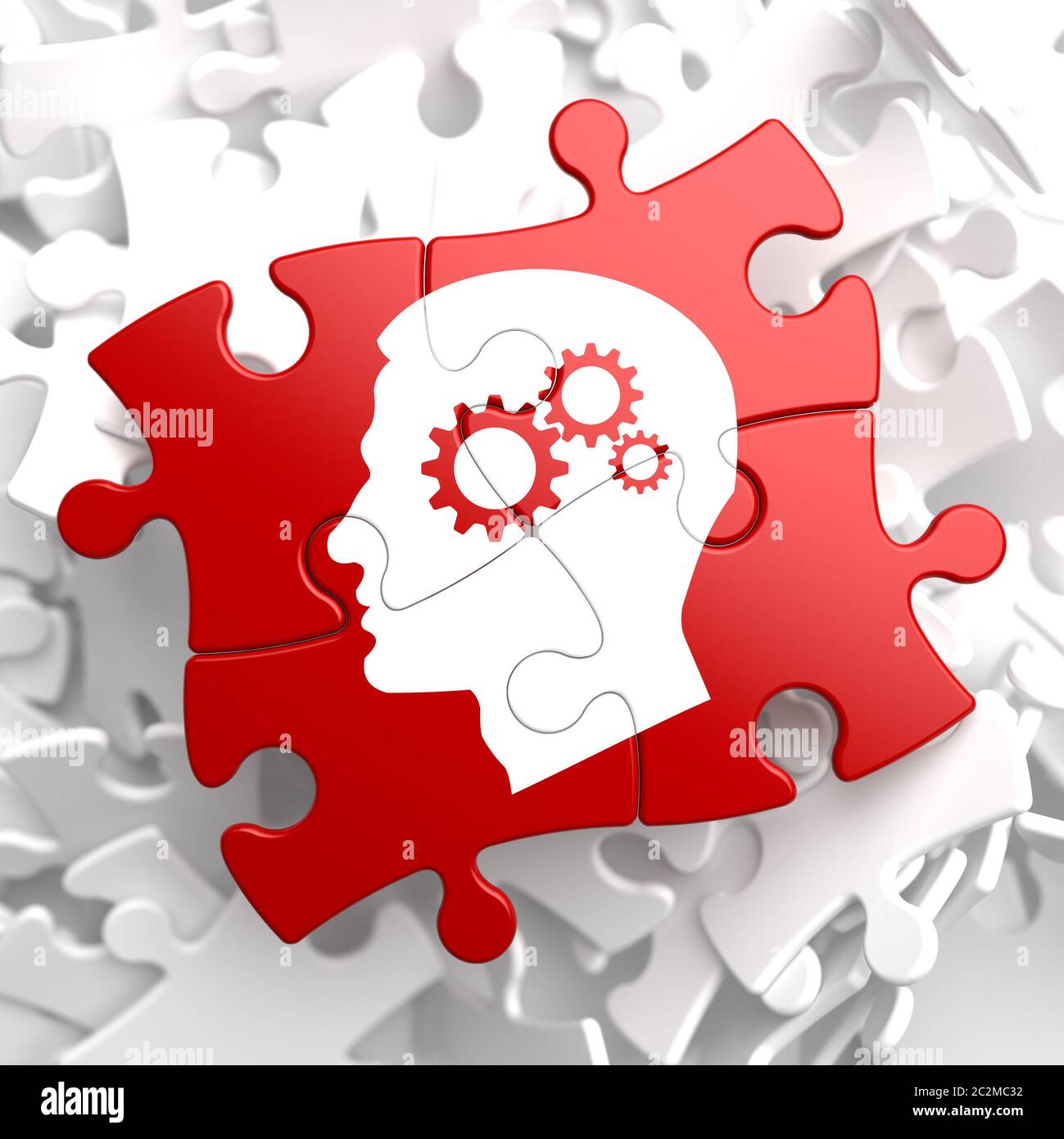 Psychologisches Konzept - Profil des Kopfes mit Zahnrad Zahnradmechanismus auf Red Puzzle. Stockfoto