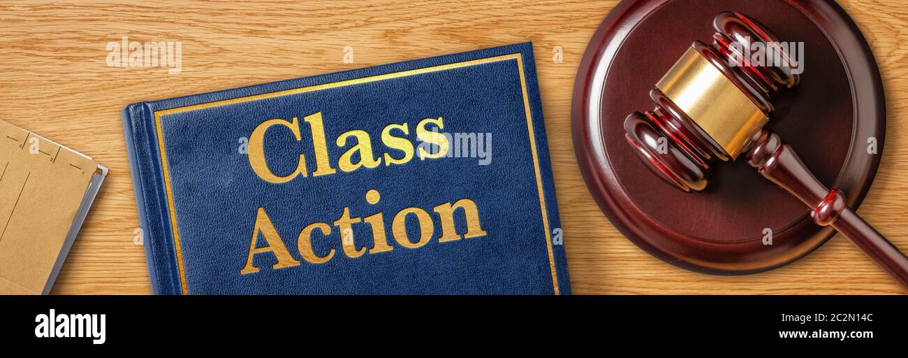 Ein Gavel mit einem Gesetzbuch - Klassenaktion Stockfoto