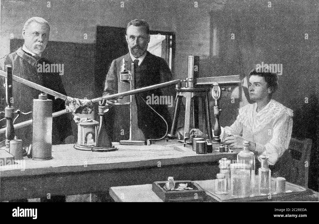Herr und Frau Curie in ihrem Labor, Vintage graviert Illustration. Aus dem Universum und der Menschheit, 1910. Stockfoto