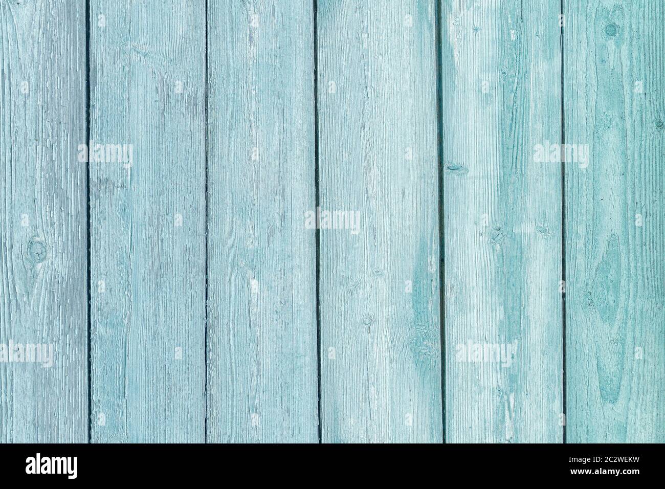 Vertikale alte Bretter mit abblätternder Farbe. Retro Hintergrund Stockfoto