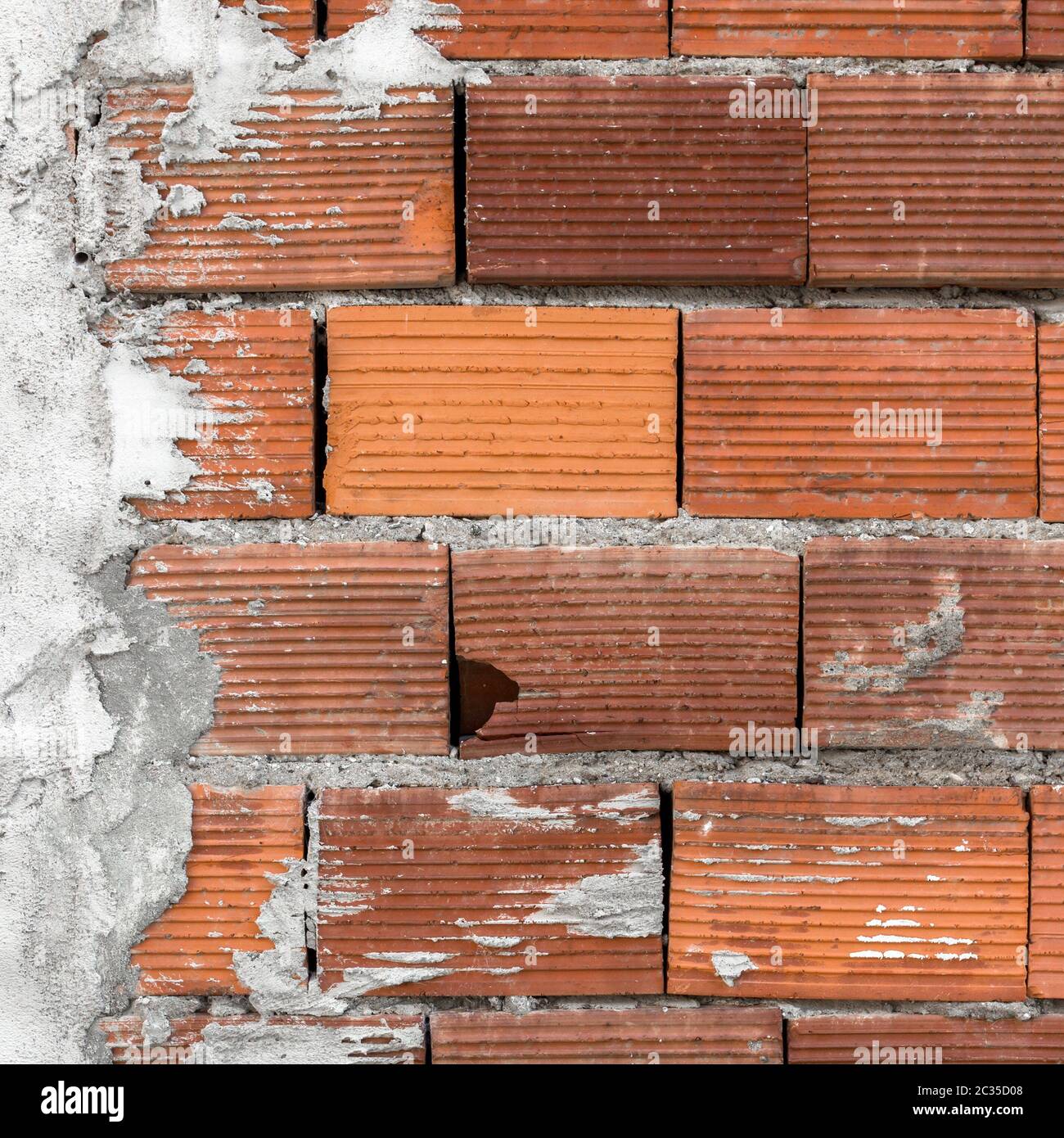 Brick Wall mit Mörtel Stockfoto