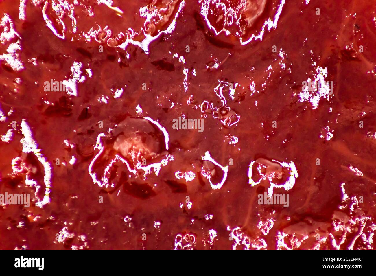 Erdbeermarmelade Hintergrund. Makro Erdbeermarmelade Hintergrund Stockfoto