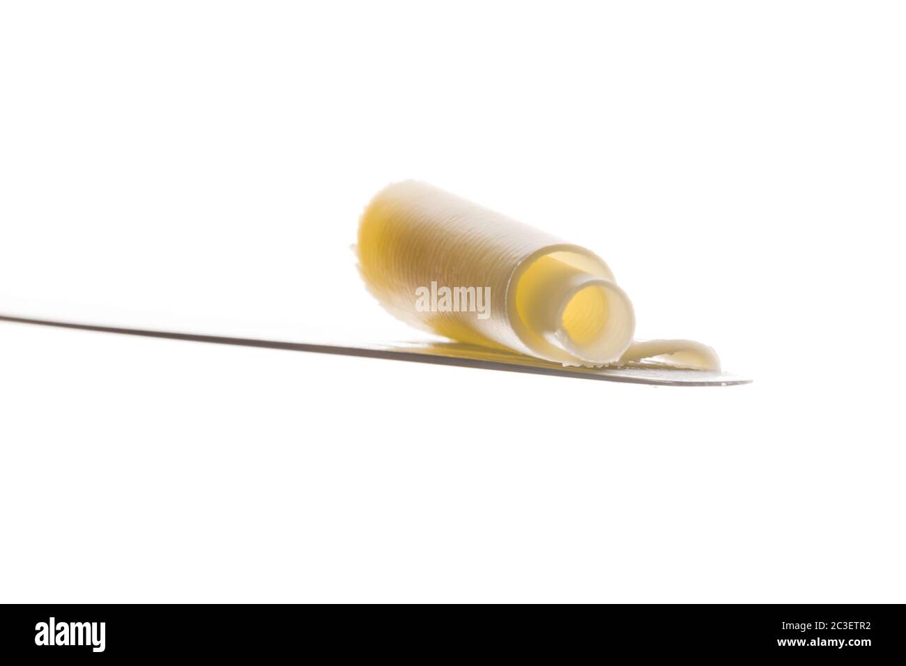 Butter wirbeln isoliert auf weiß. Stockfoto