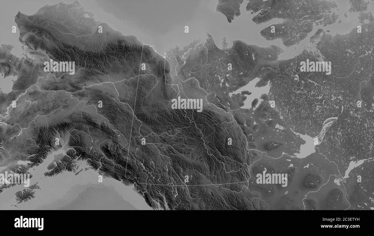 Yukon, Gebiet von Kanada. Graustufen-Karte mit Seen und Flüssen. Form, die gegenüber dem Landesgebiet umrissen ist. 3D-Rendering Stockfoto