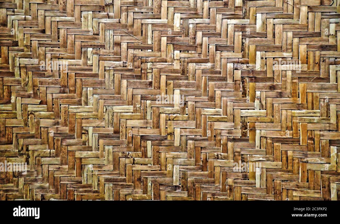 Eine alte gewebte Bambusgrasmatte Stockfoto